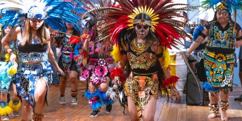 Day of the Dead Celebration With Dancers Dressed in Symbolic Attire